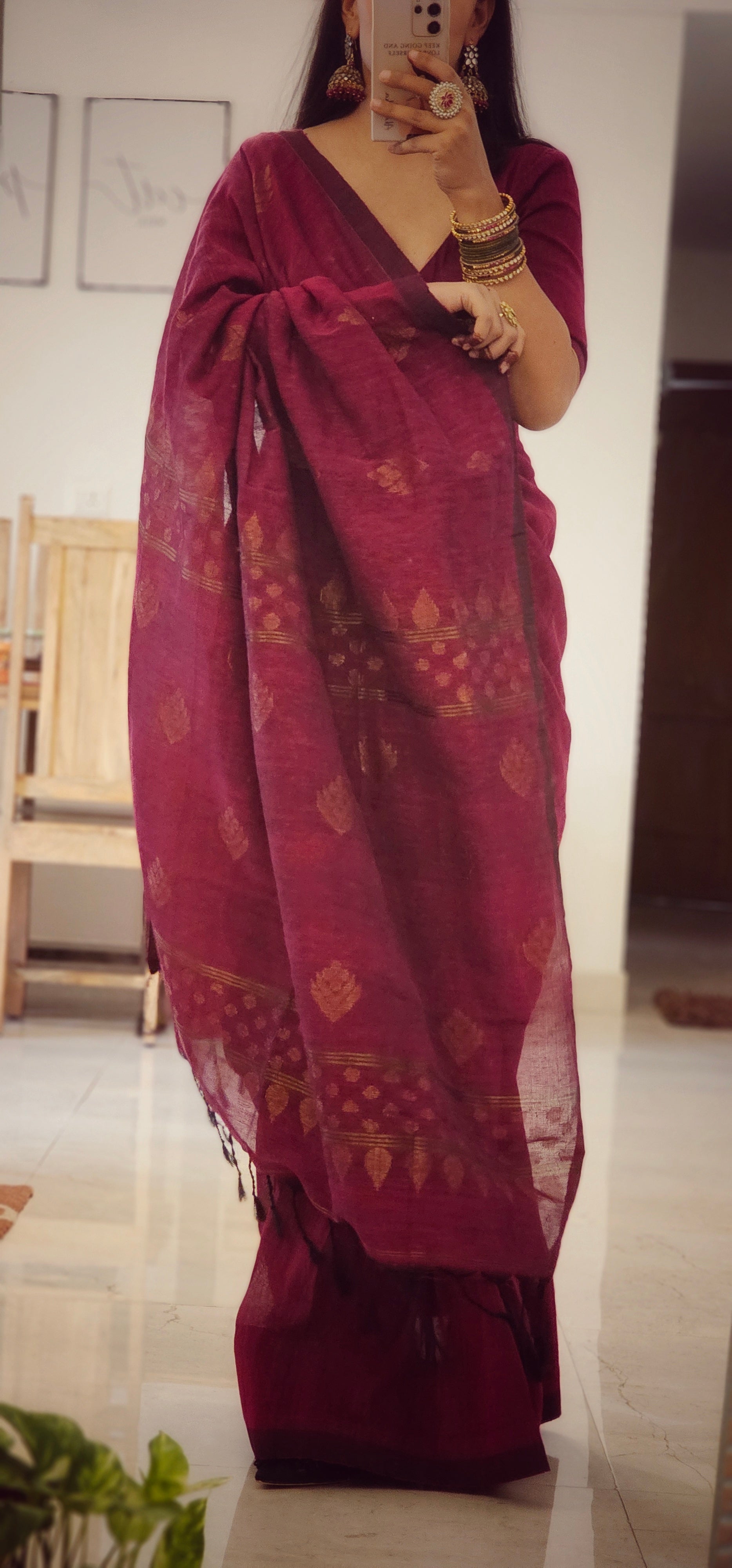 Wine pure handwoven linen saree with zari booti design