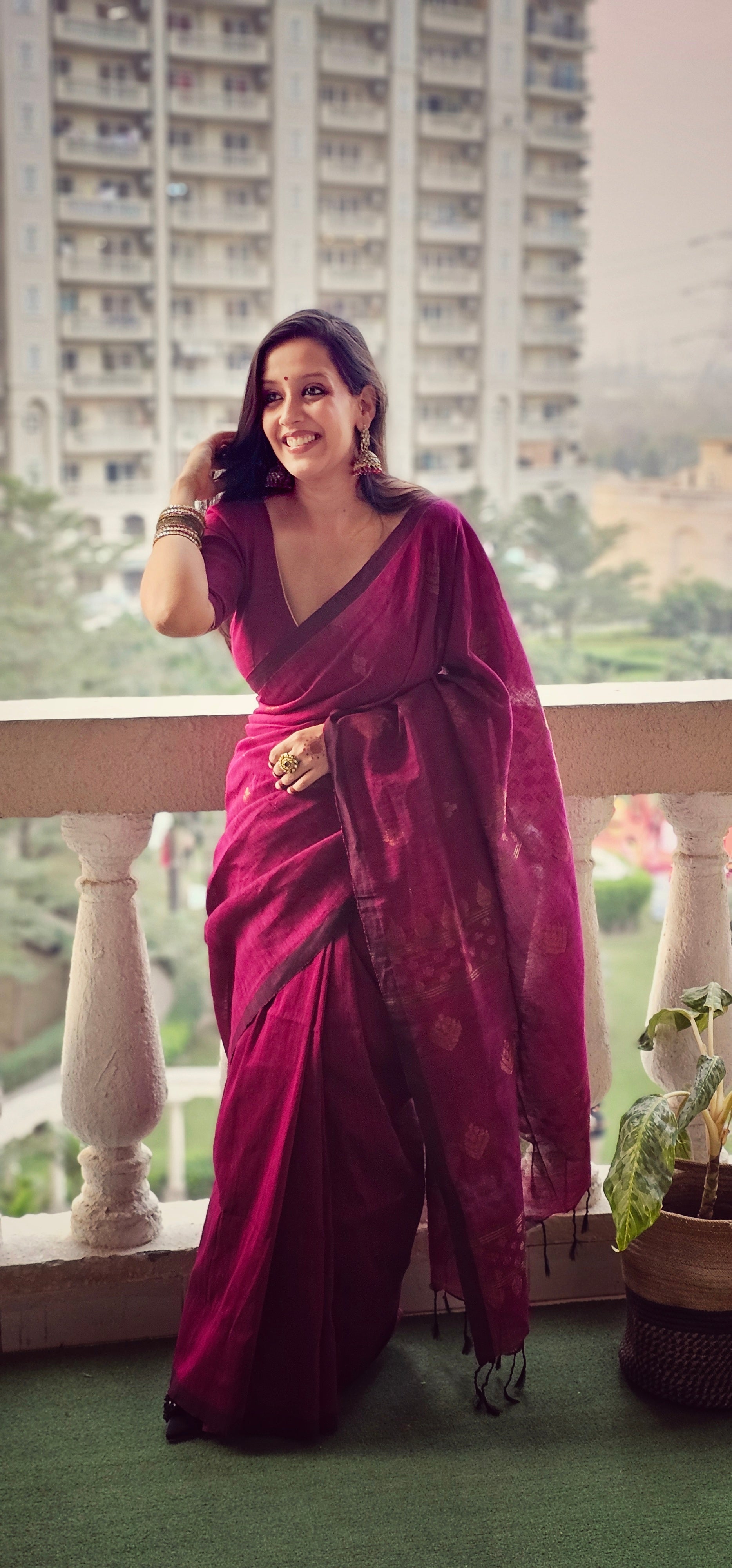Wine pure handwoven linen saree with zari booti design