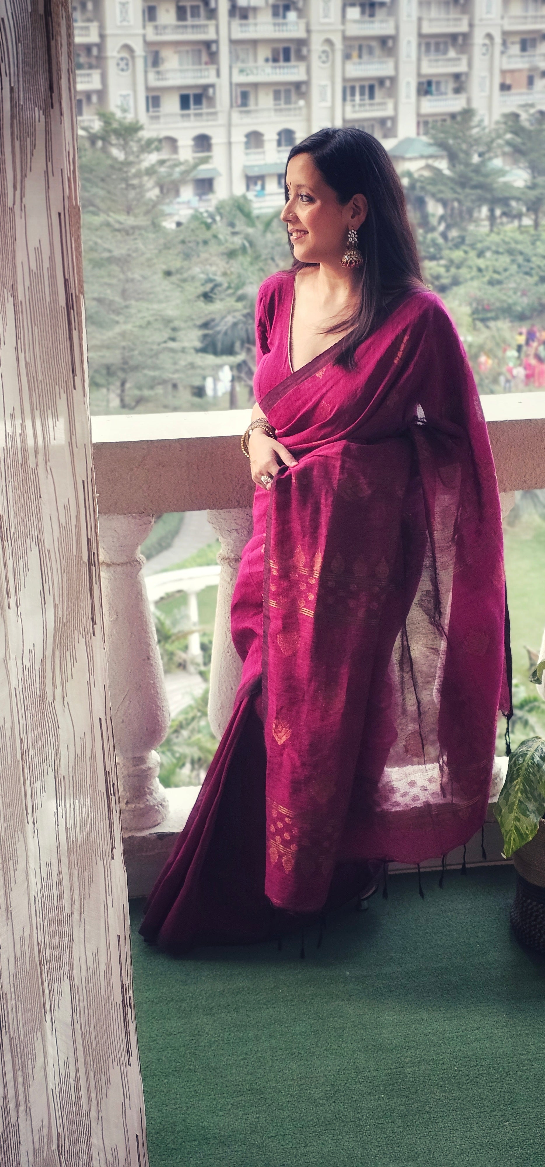 Wine pure handwoven linen saree with zari booti design