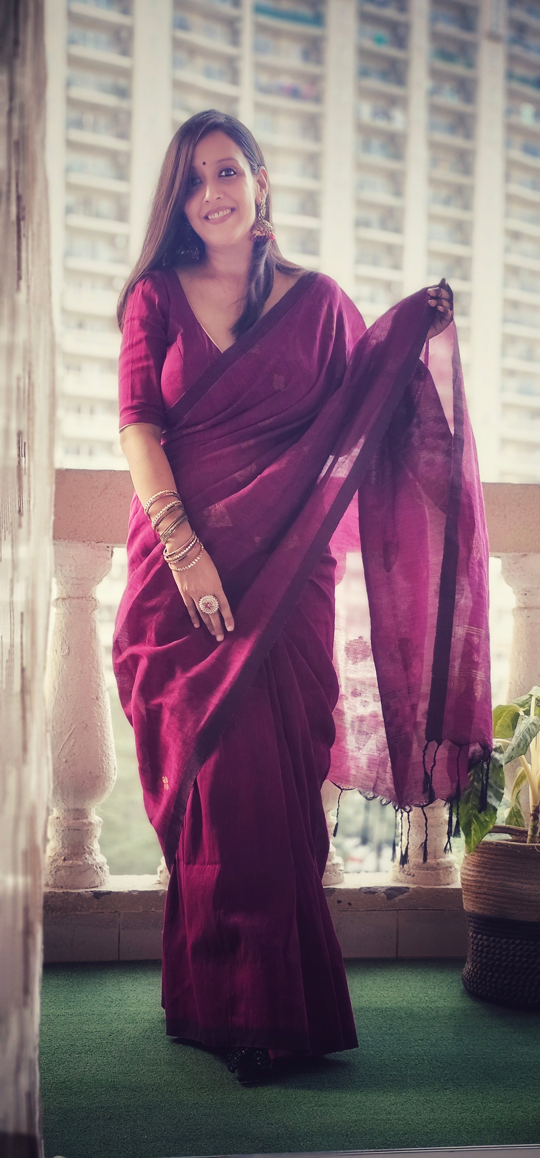 Wine pure handwoven linen saree with zari booti design