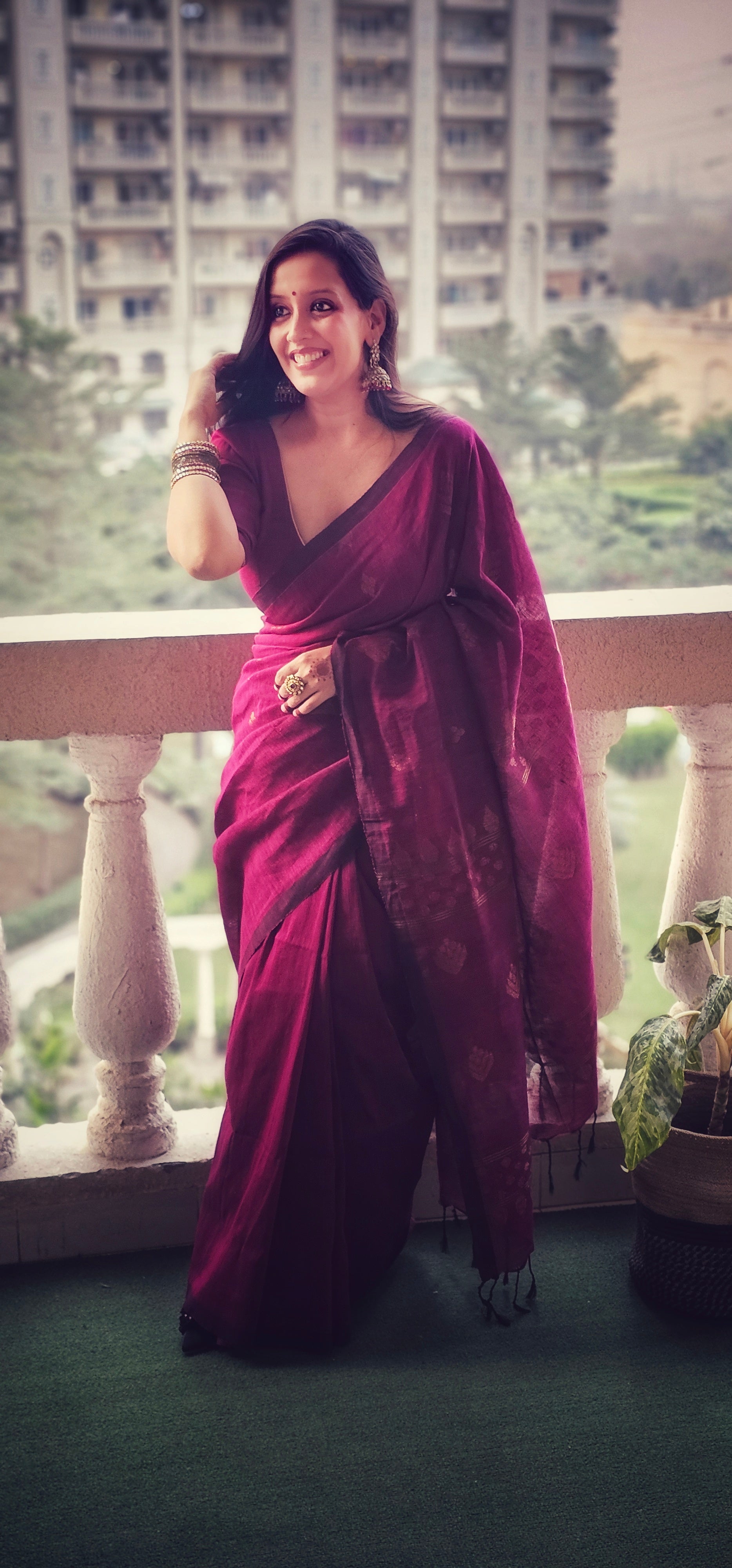 Wine pure handwoven linen saree with zari booti design
