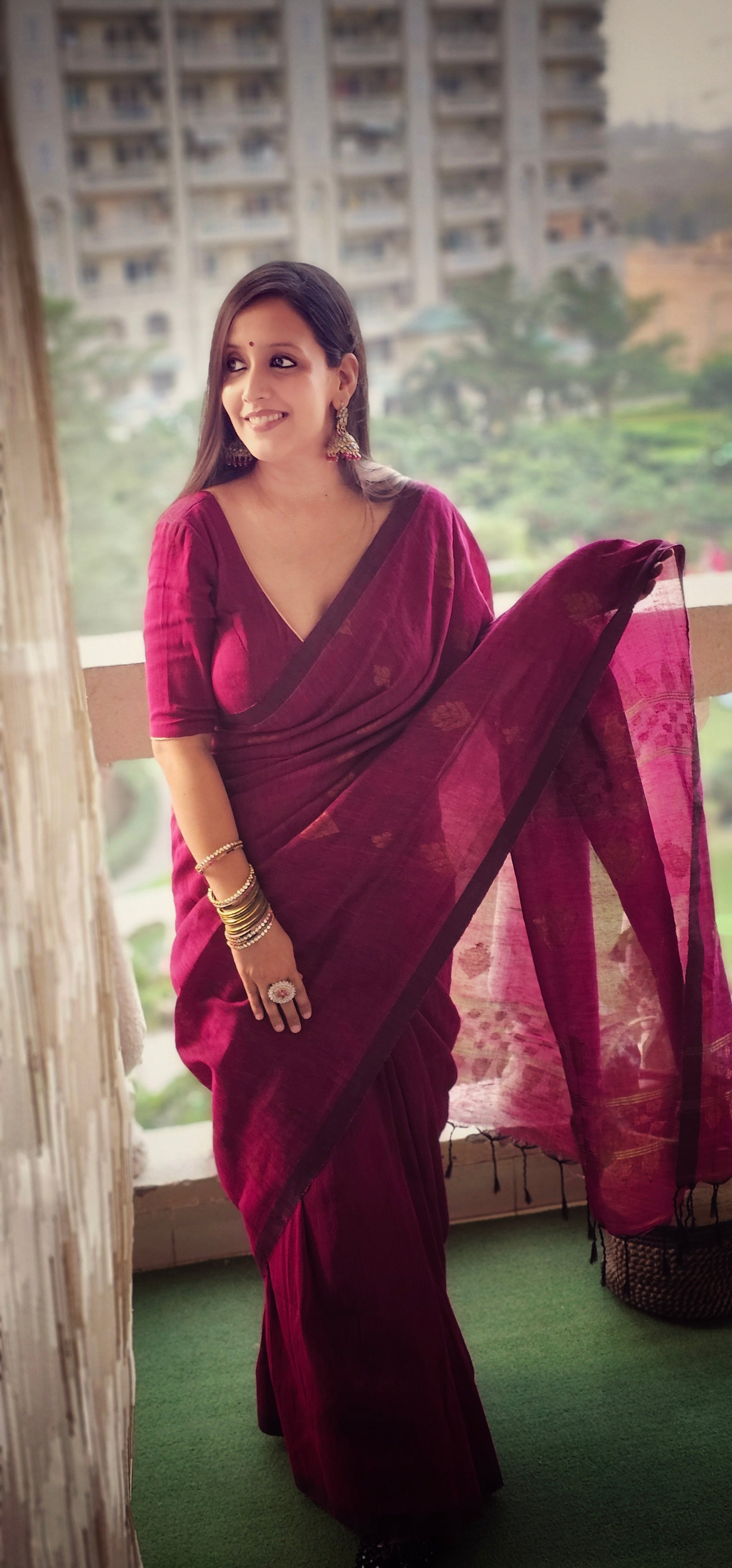 Wine pure handwoven linen saree with zari booti design