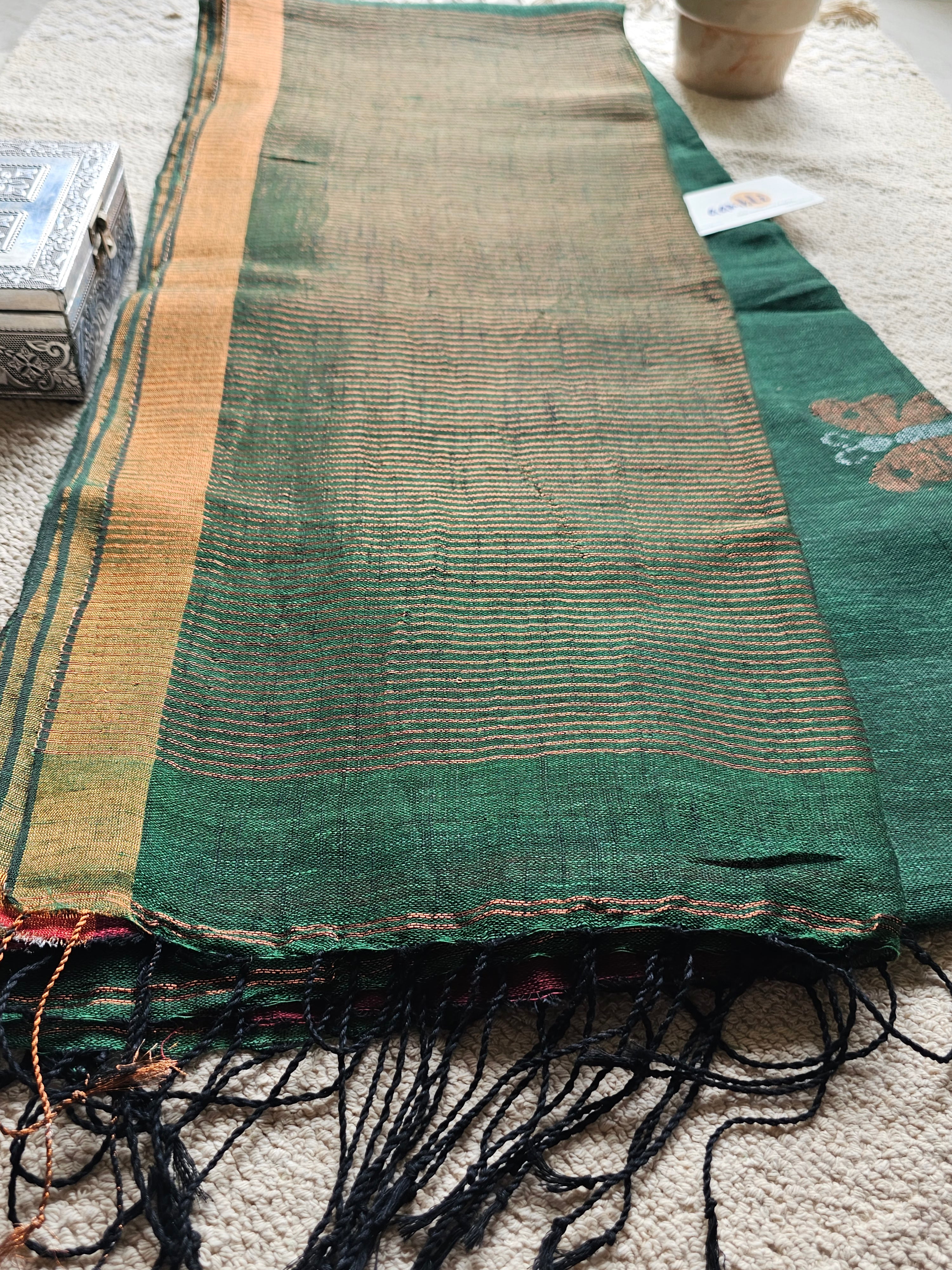 Green pure handwoven linen saree with zari butterfly design