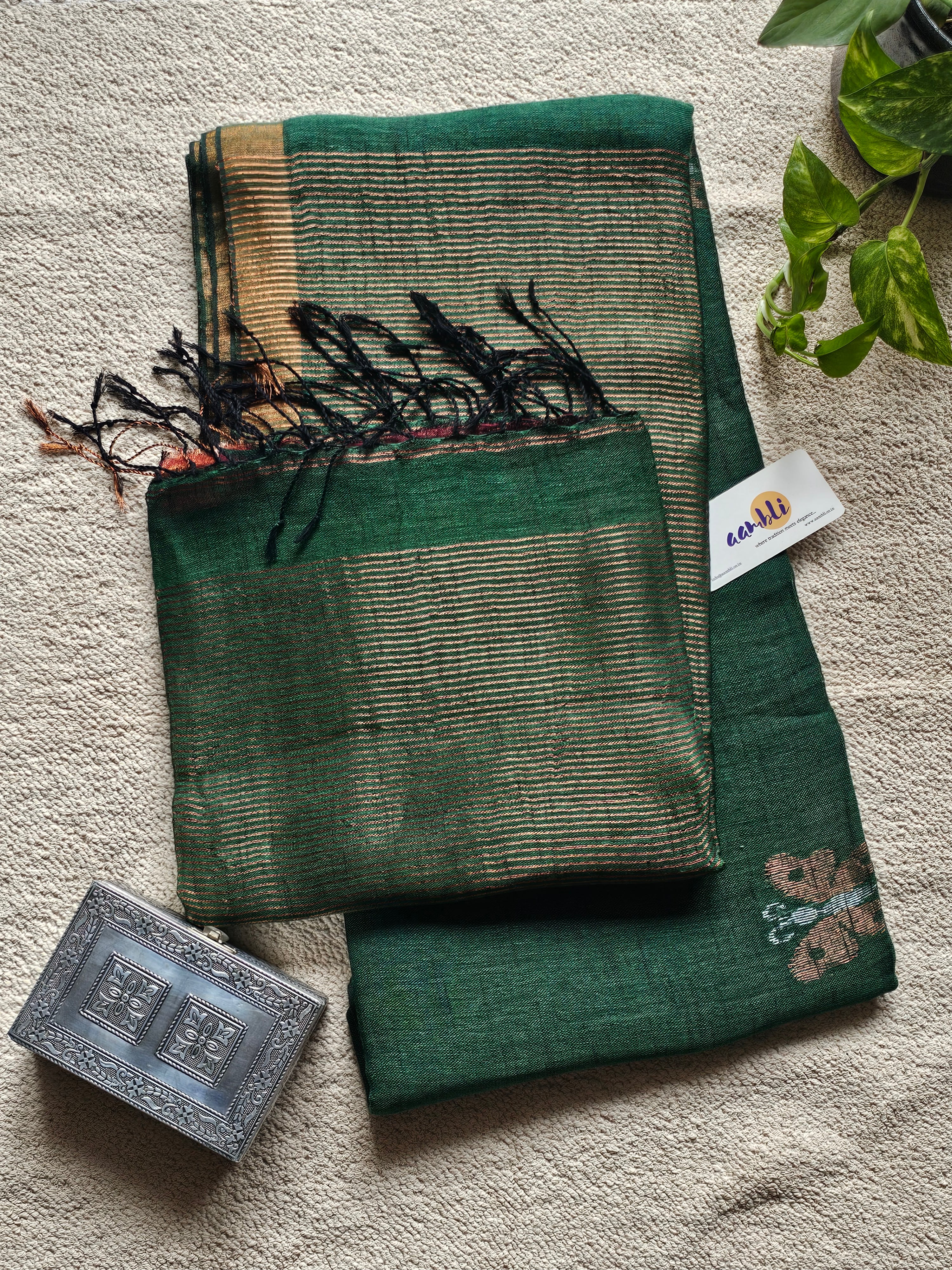 Green pure handwoven linen saree with zari butterfly design