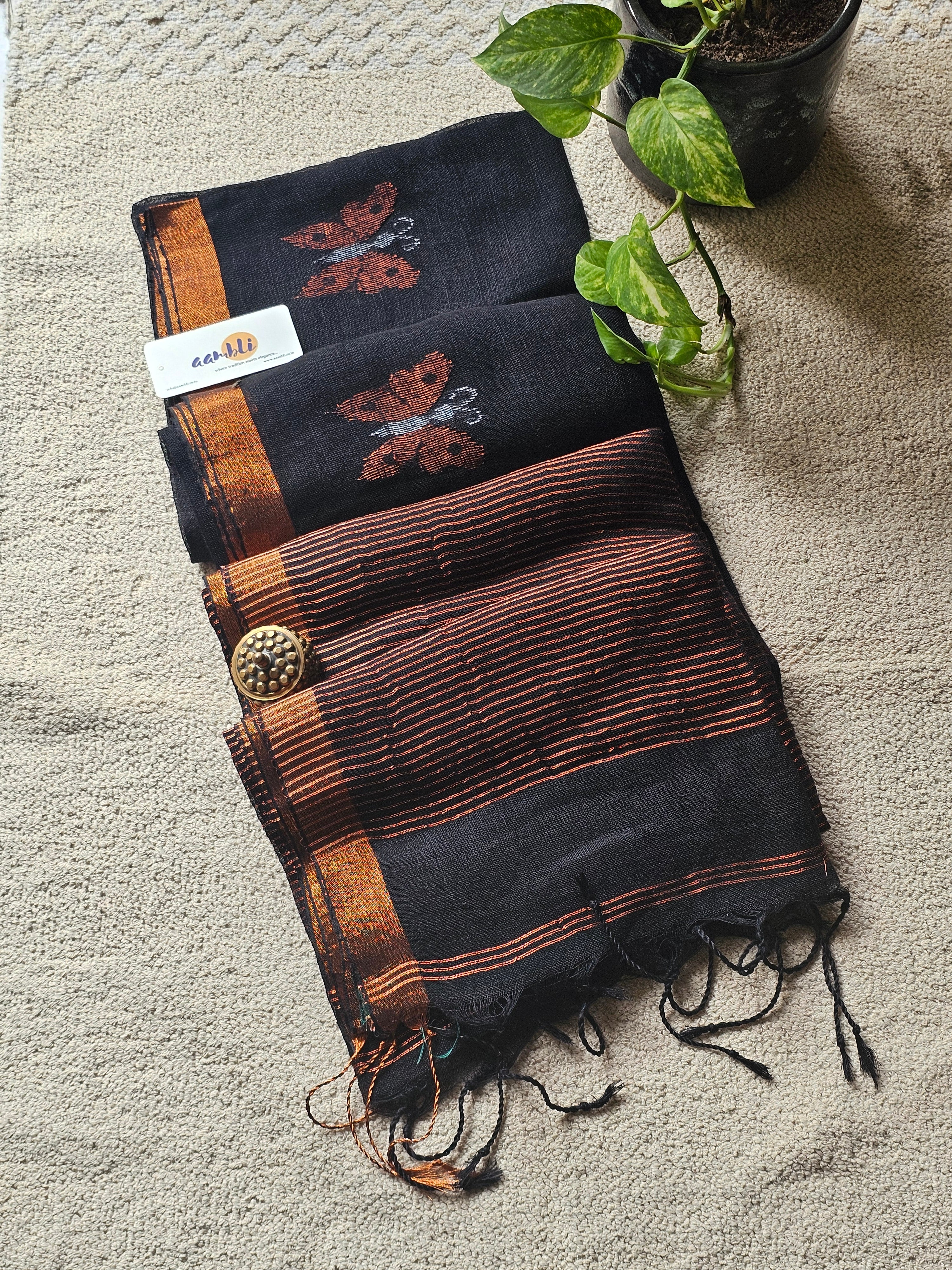 Black pure handwoven linen saree with zari butterfly design