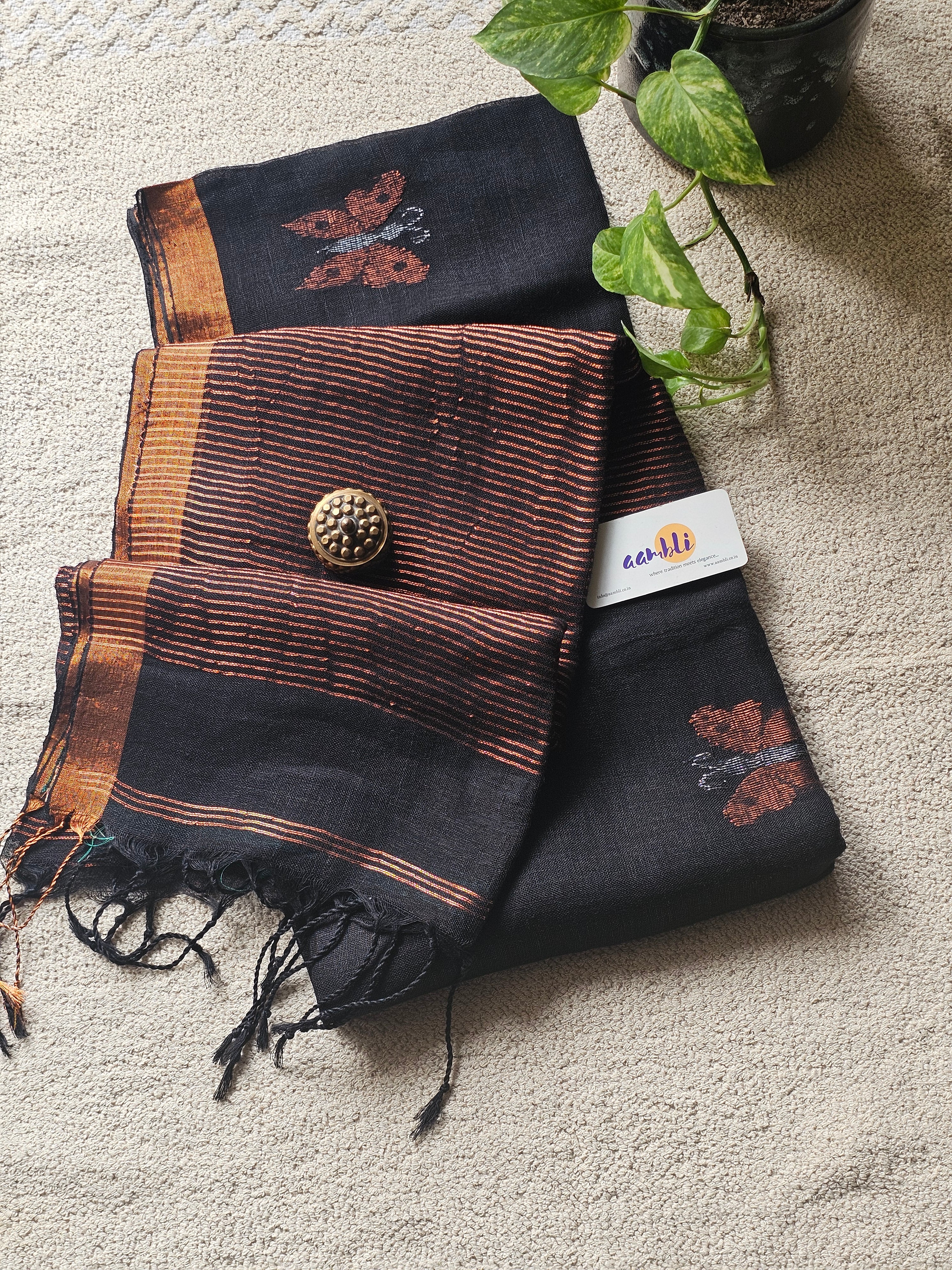 Black pure handwoven linen saree with zari butterfly design