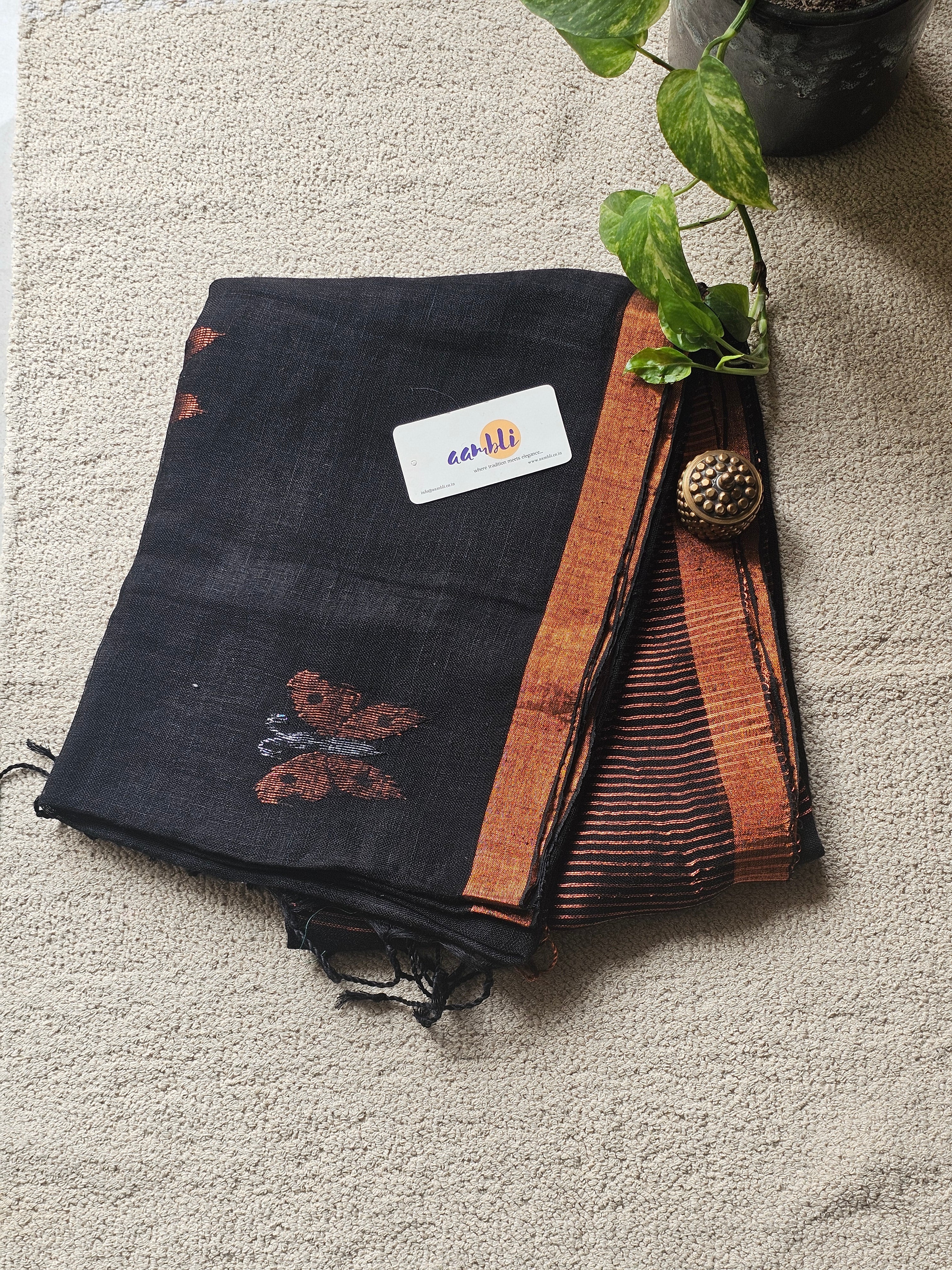 Black pure handwoven linen saree with zari butterfly design