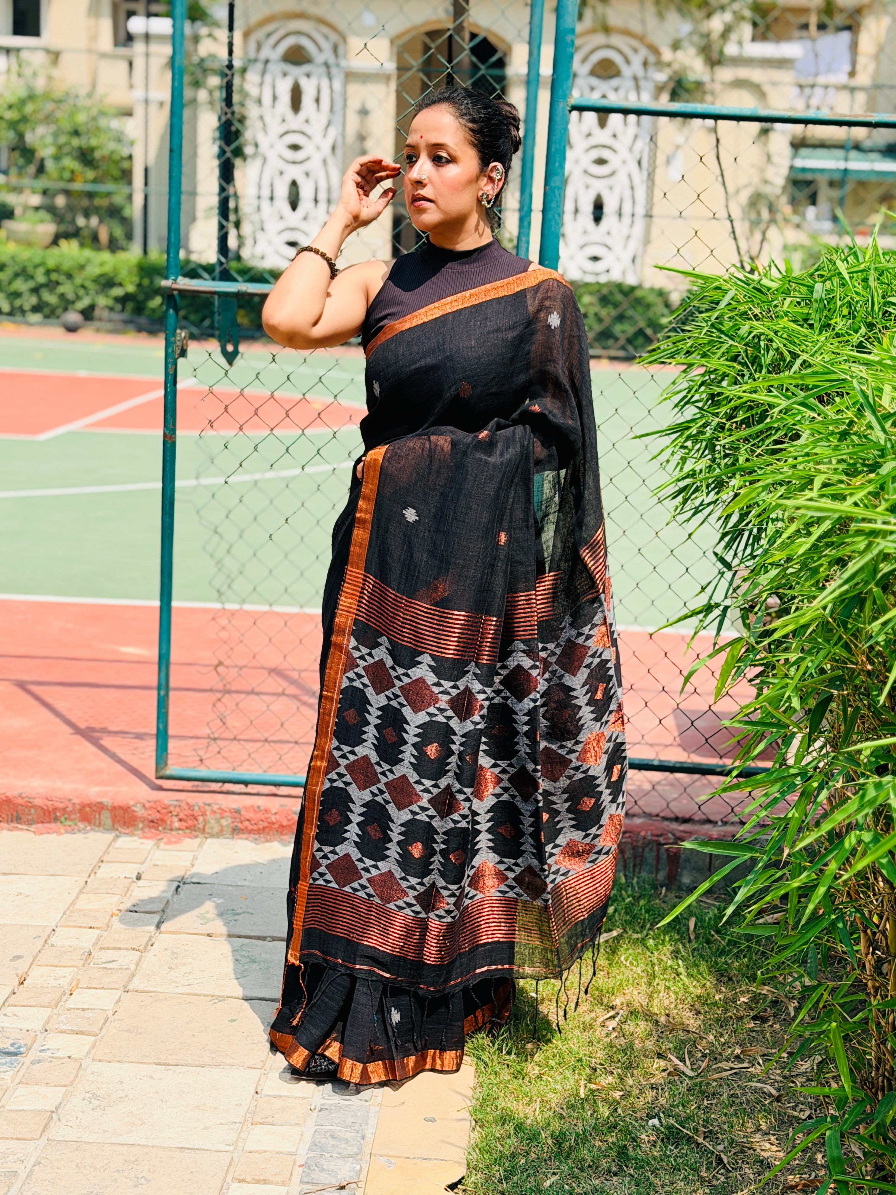 Black Pure handwoven linen saree with burfi design