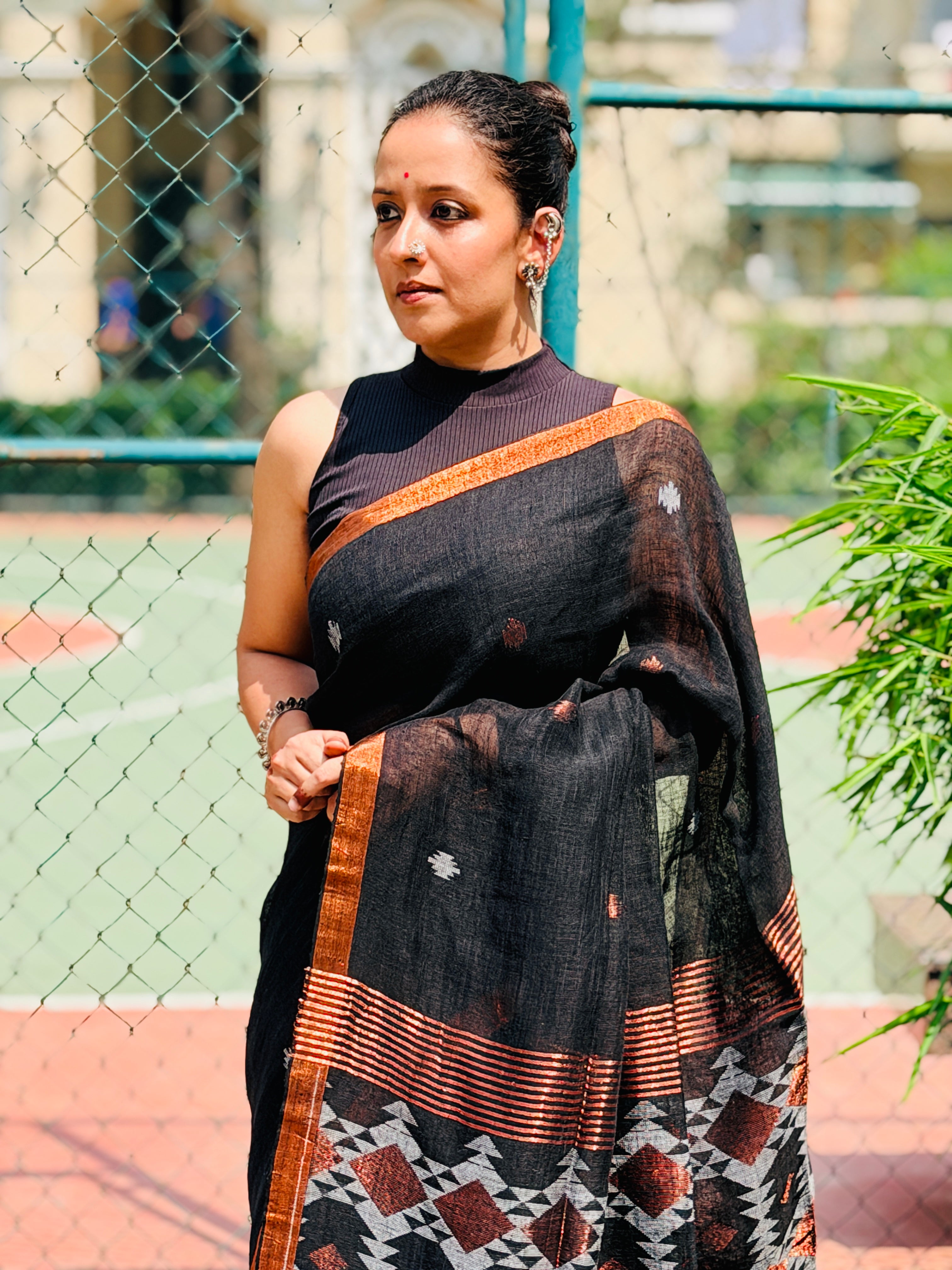 Black Pure handwoven linen saree with burfi design