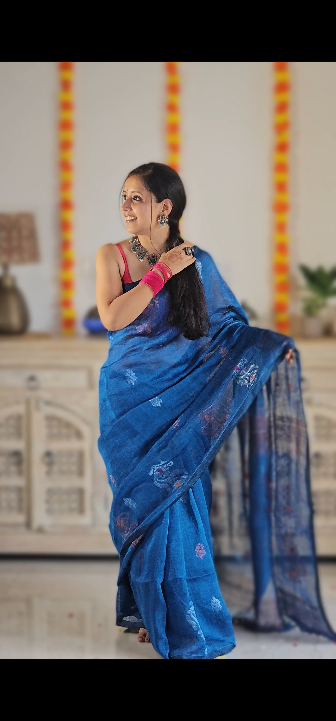 Blue flower pure handwoven linen saree with zari flowers
