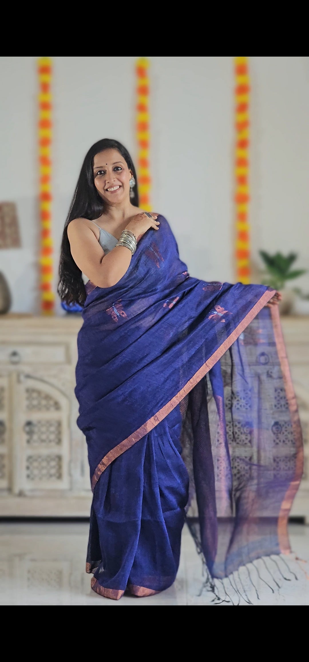 Purple pure handwoven linen saree with zari butterfly design