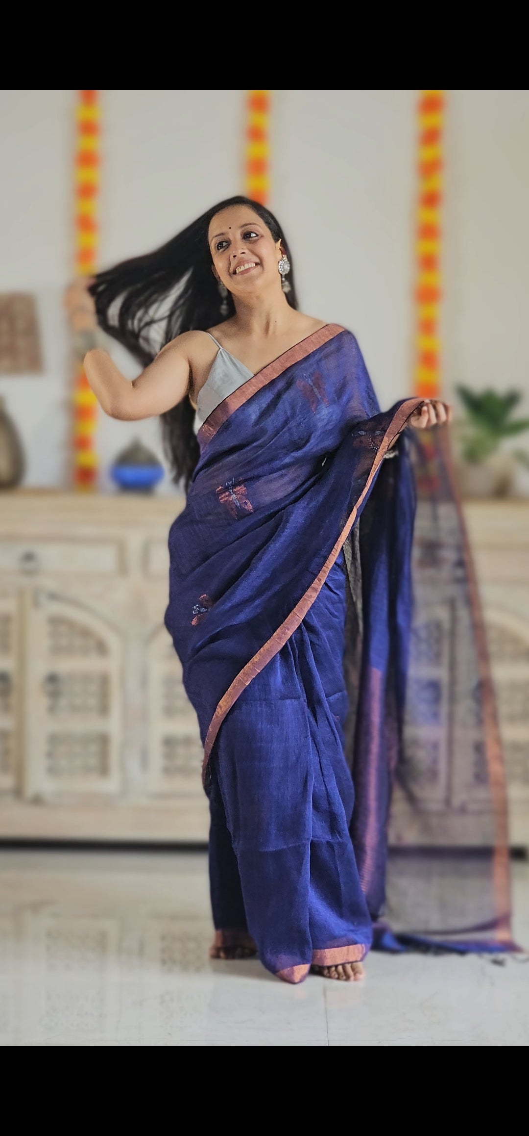 Purple pure handwoven linen saree with zari butterfly design
