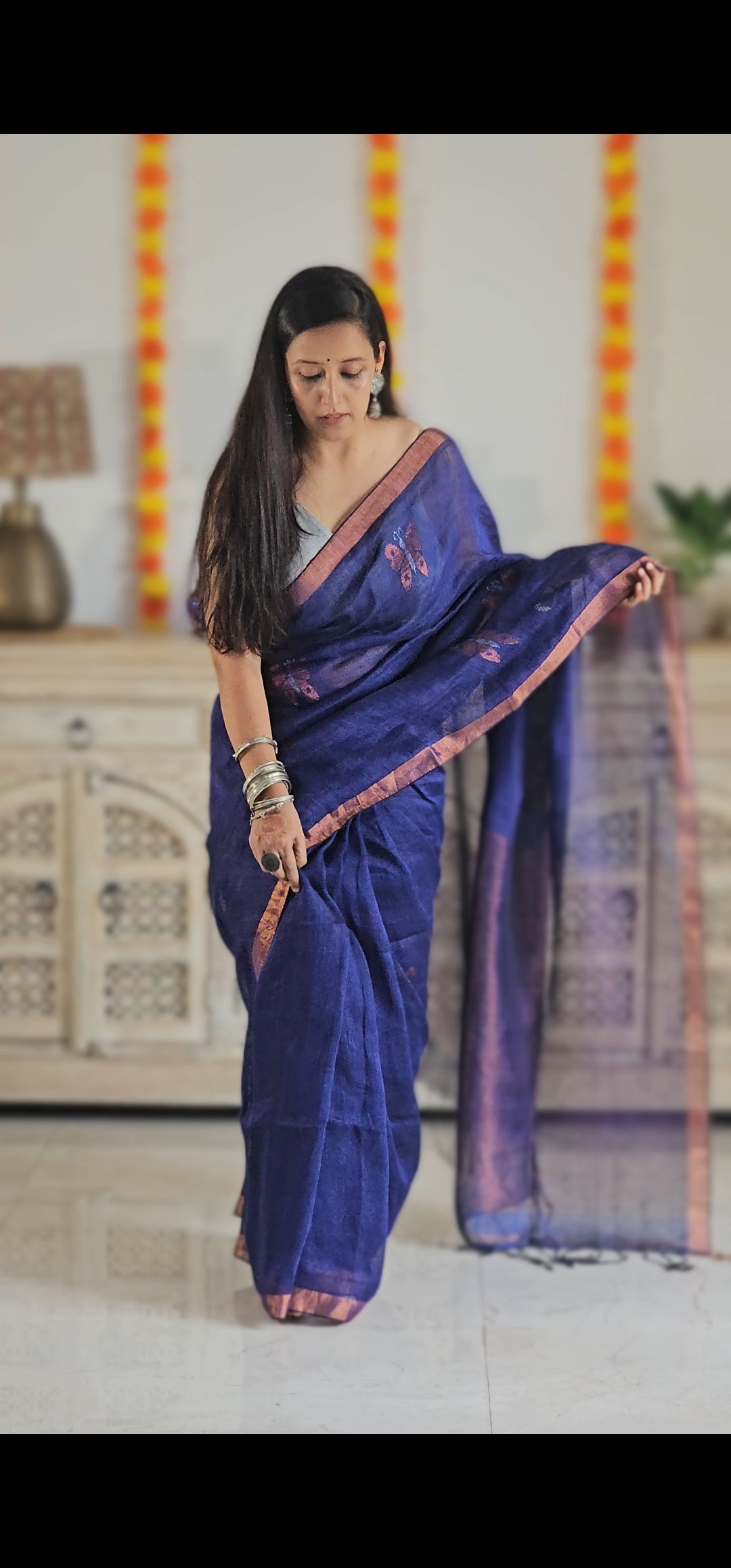 Purple pure handwoven linen saree with zari butterfly design