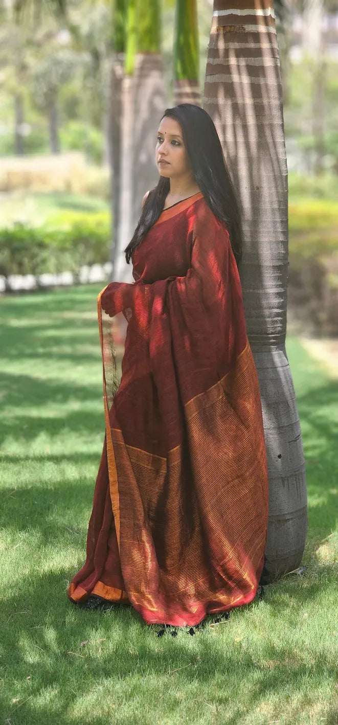 Maroon Pure Handwoven Linen saree with Zari strips