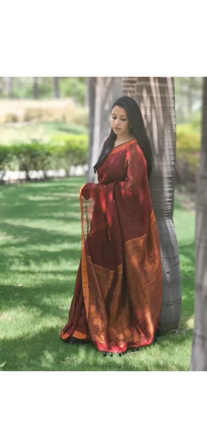 Maroon Pure Handwoven Linen saree with Zari strips
