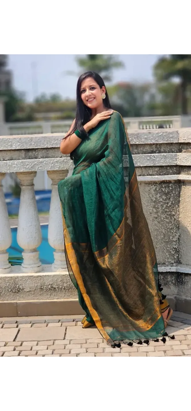 Green Pure Handwoven Linen saree with Zari strips