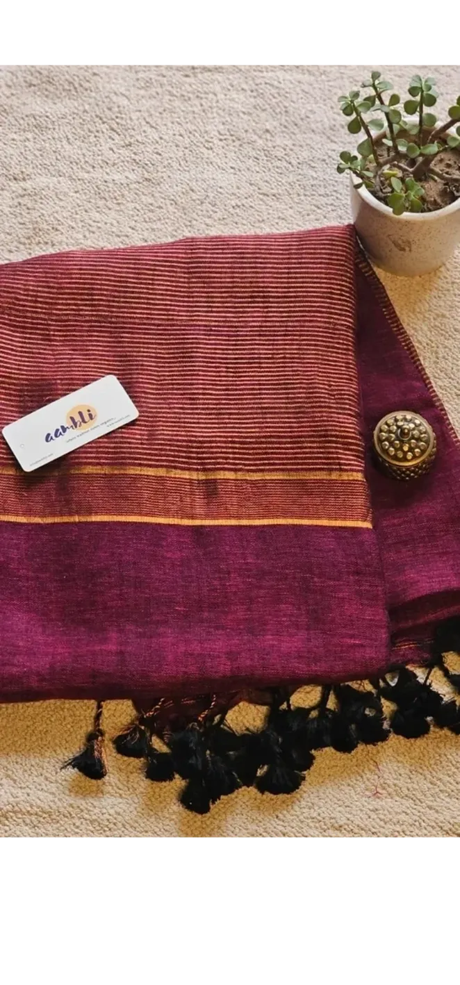 Magenta Pure Handwoven Linen saree with Zari strips