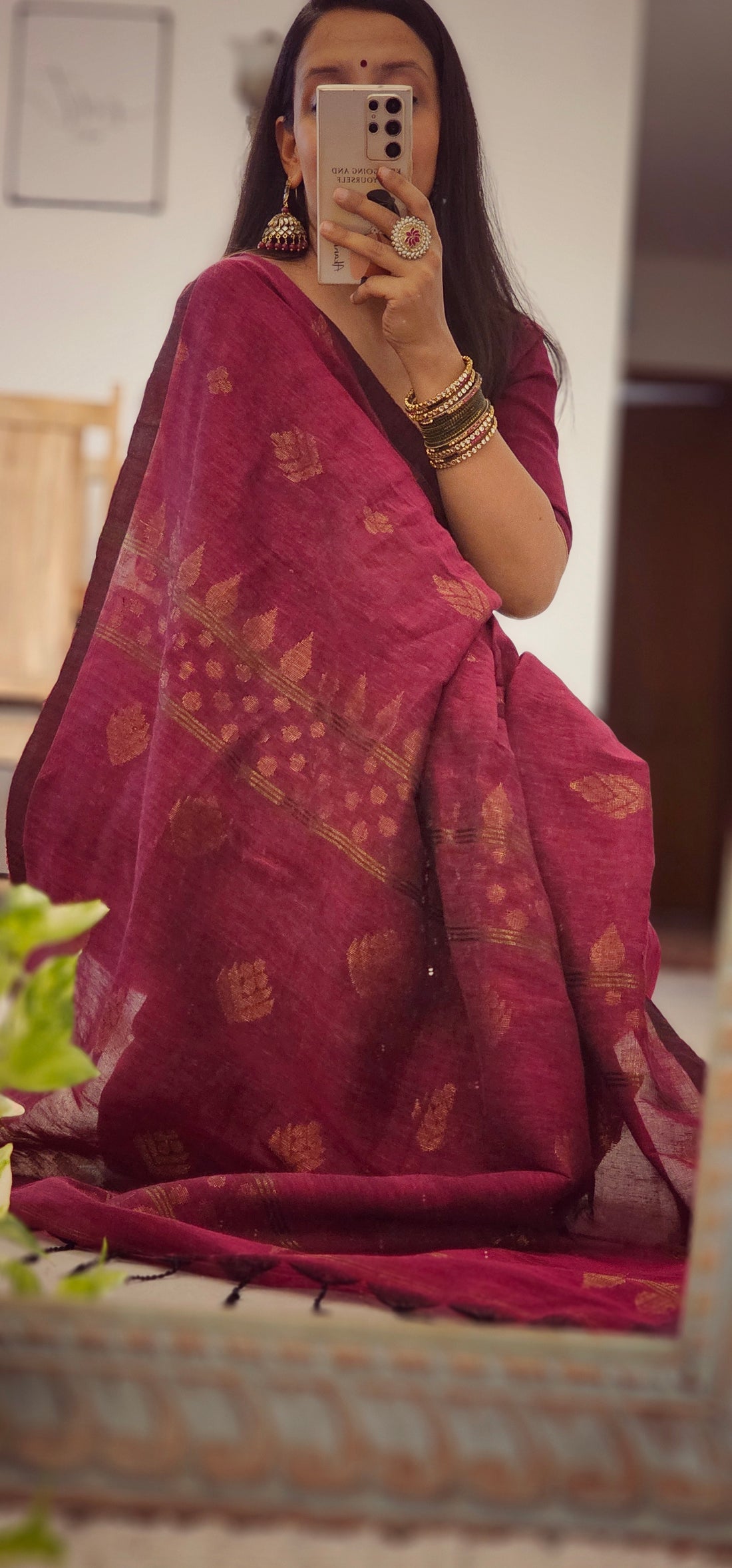 Wine pure handwoven linen saree with zari booti design