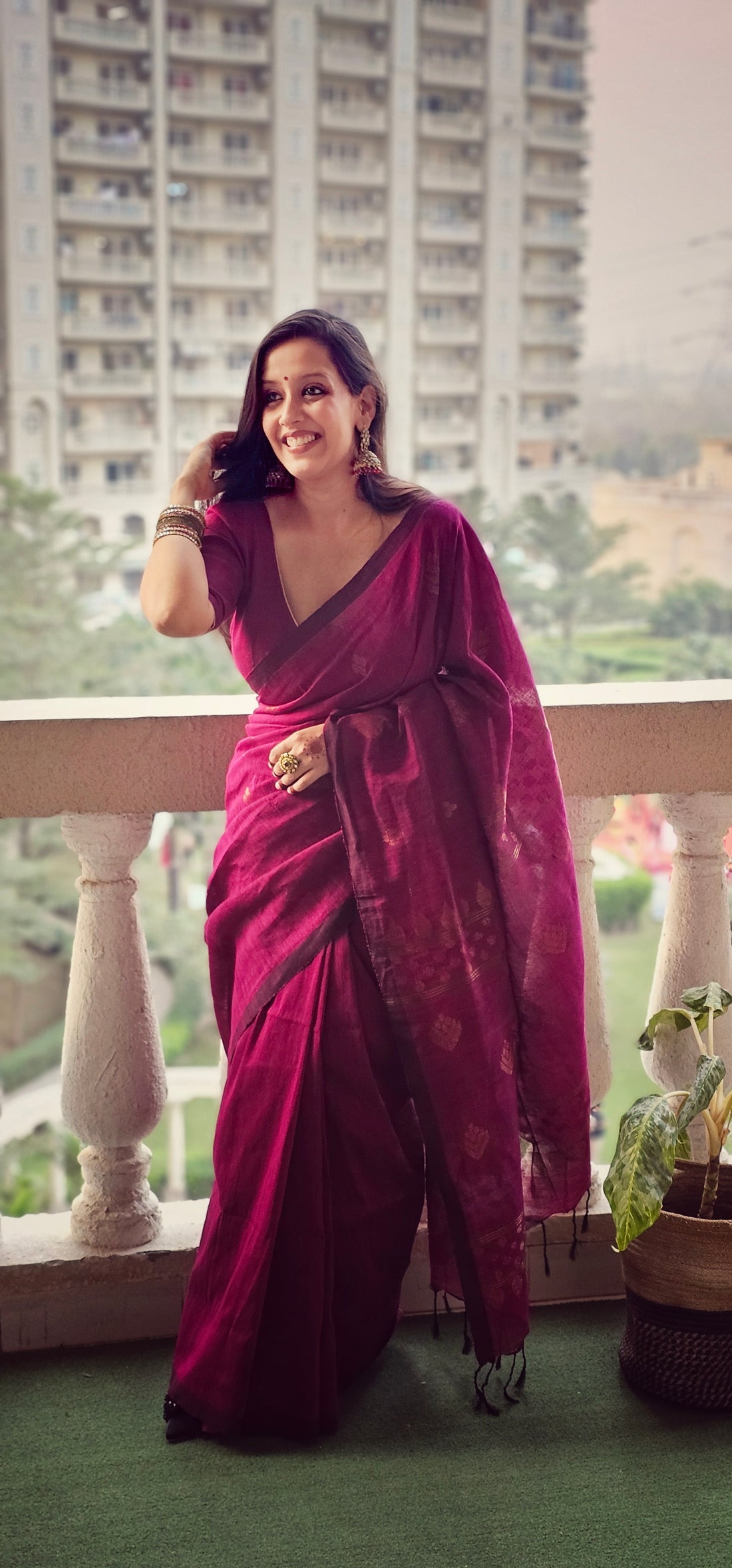 Wine pure handwoven linen saree with zari booti design