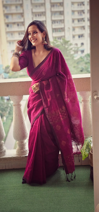 Wine pure handwoven linen saree with zari booti design