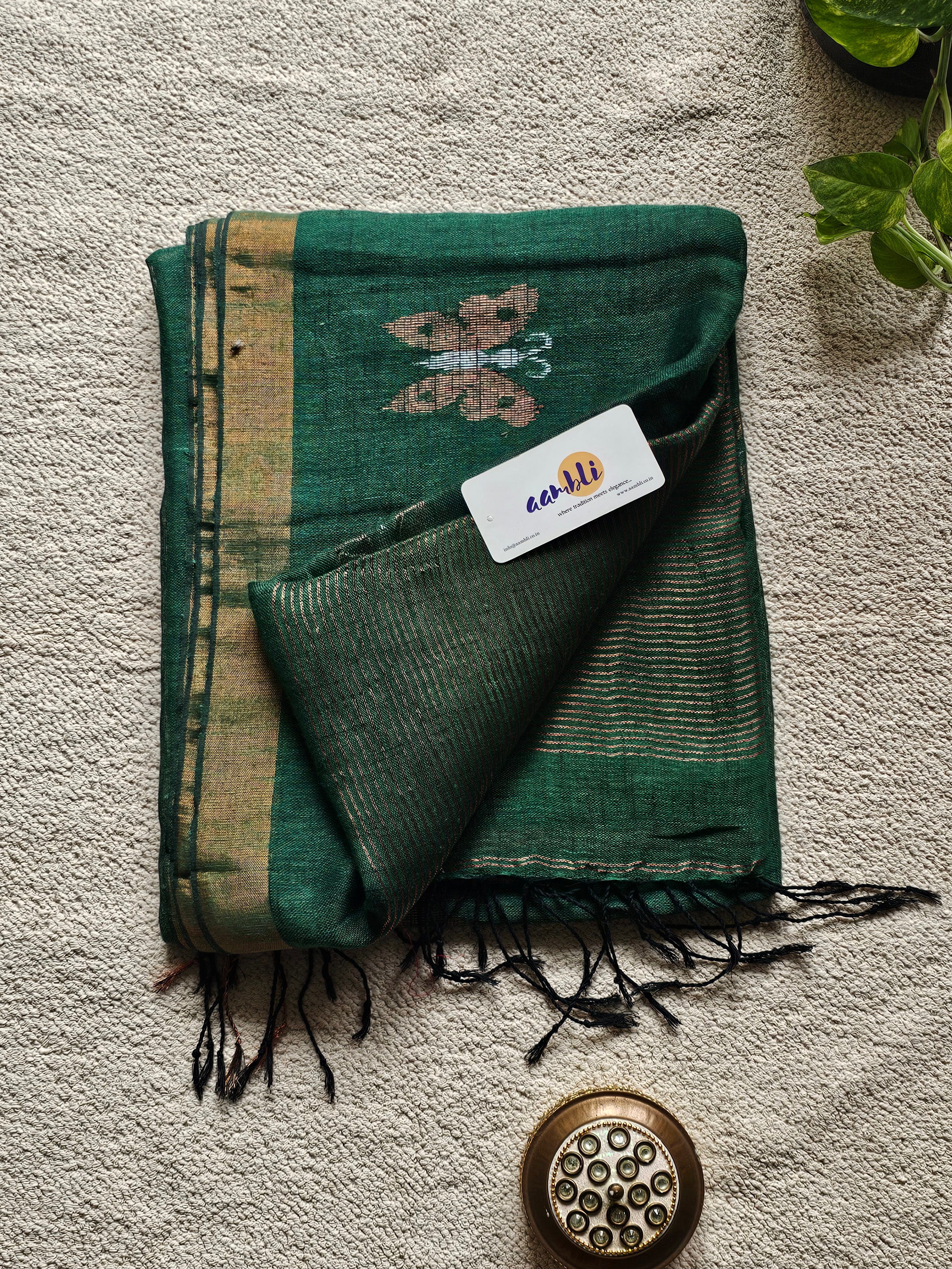 Green pure handwoven linen saree with zari butterfly design