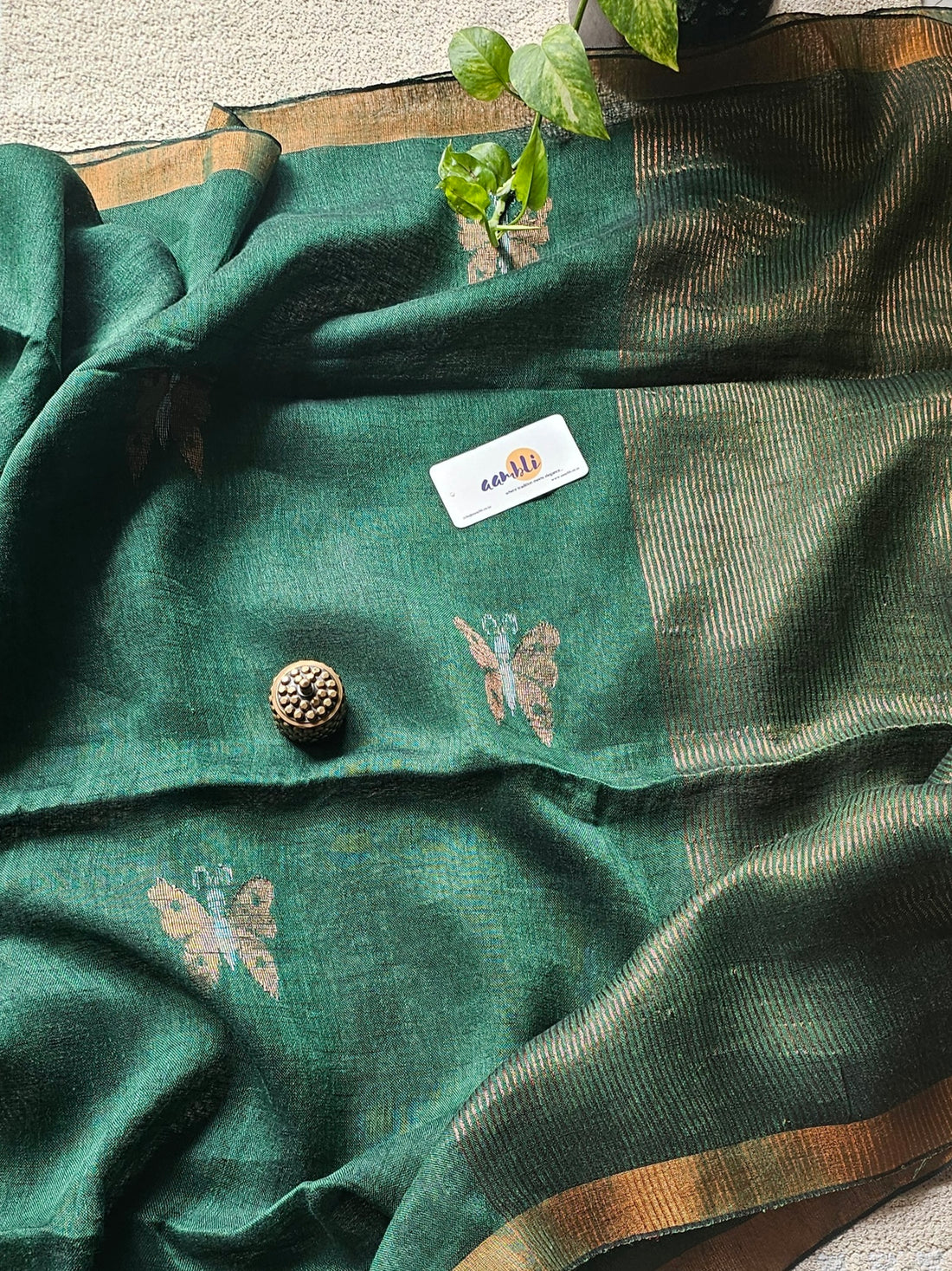 Green pure handwoven linen saree with zari butterfly design