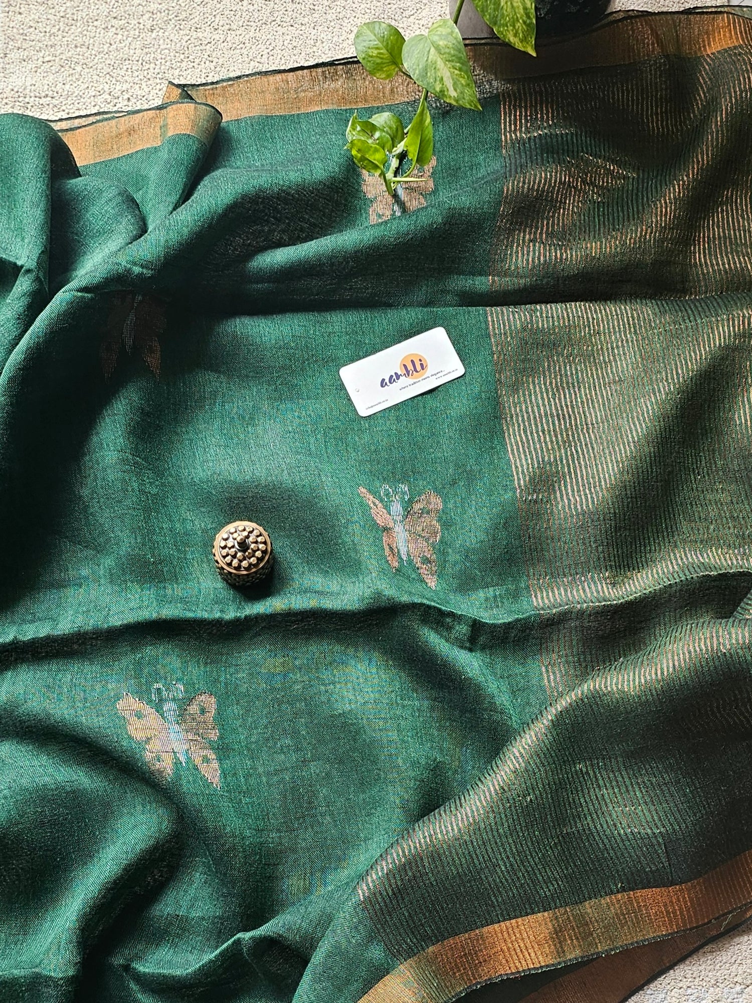Green pure handwoven linen saree with zari butterfly design