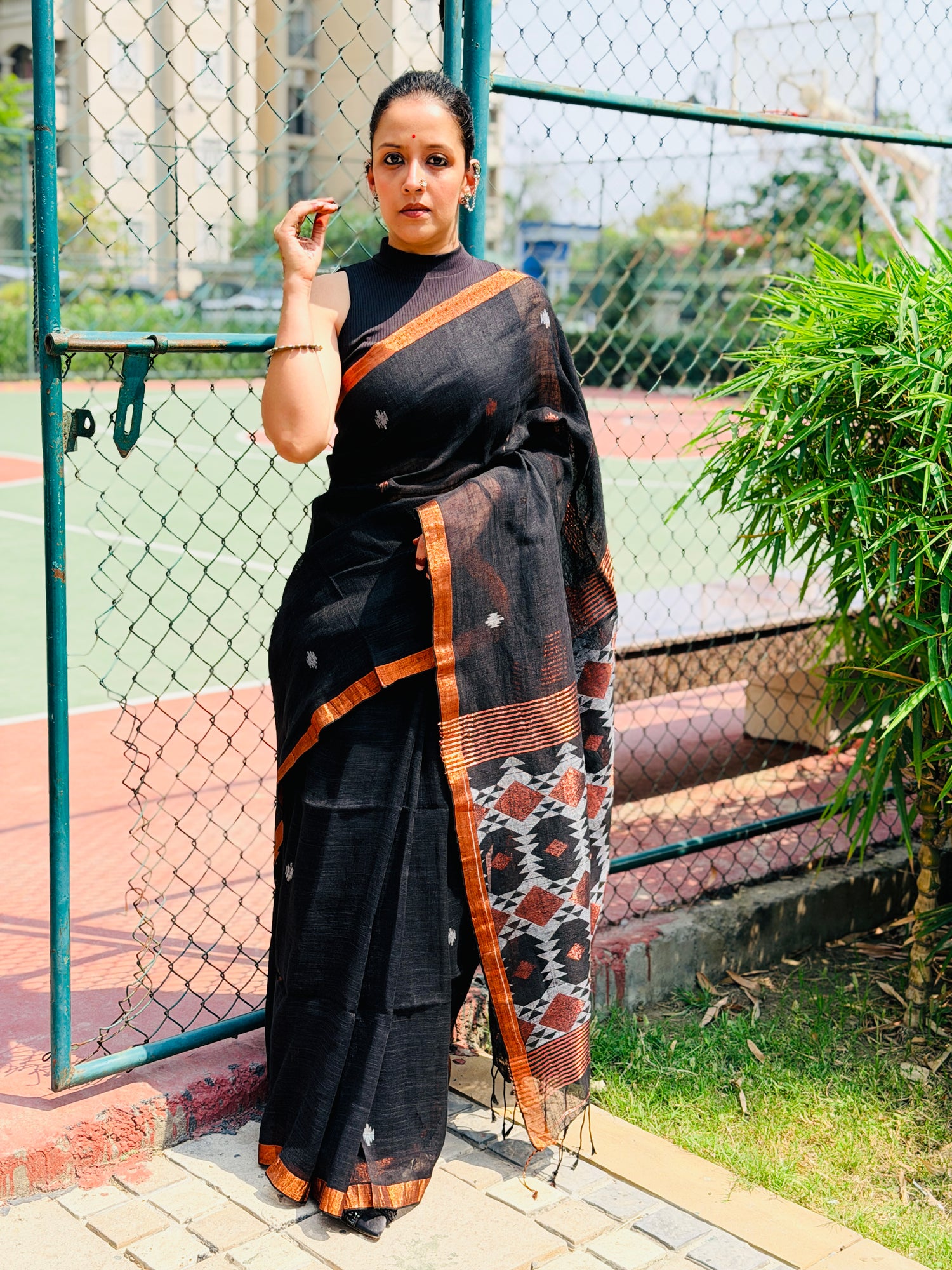Black Pure handwoven linen saree with burfi design