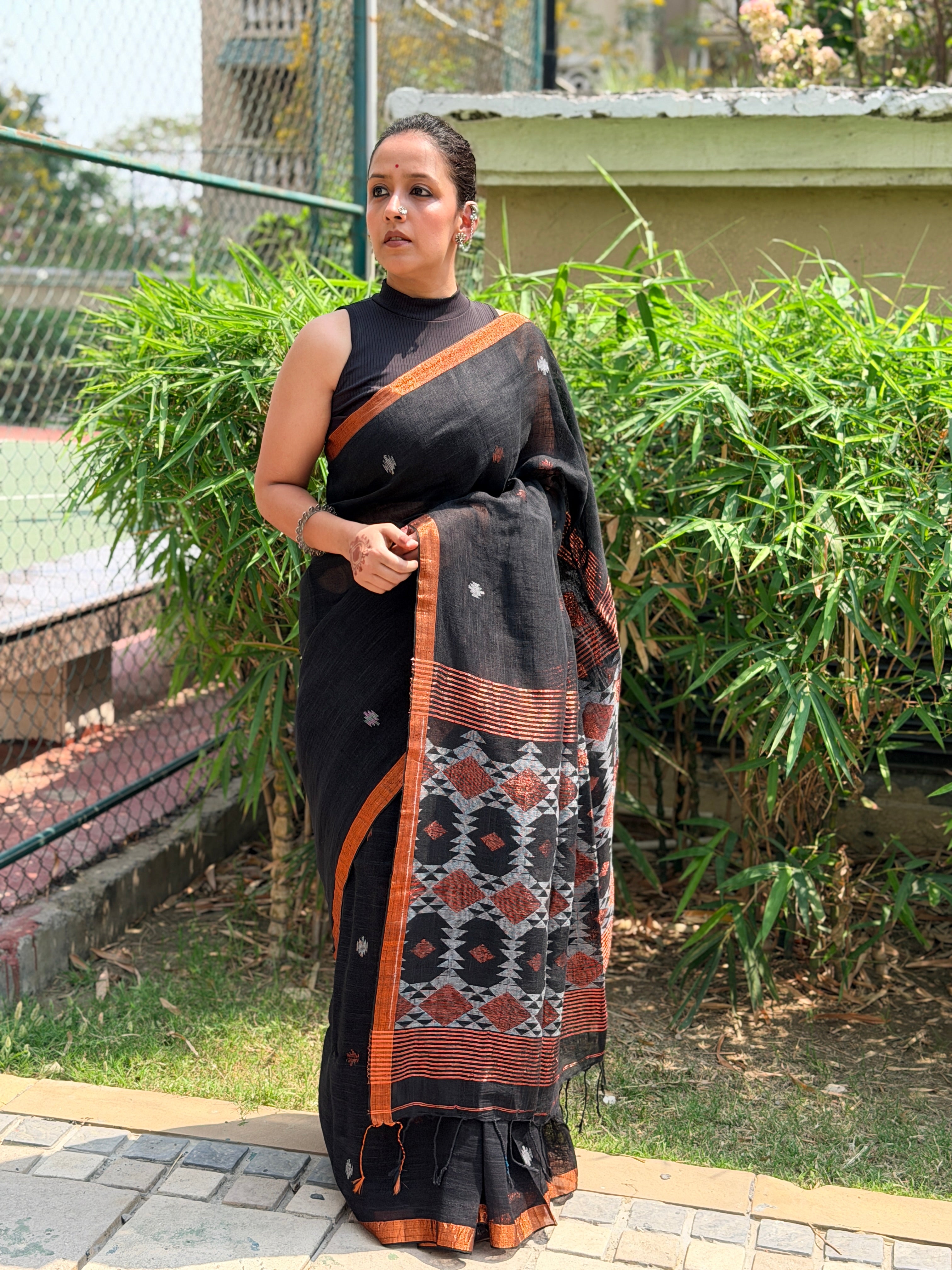 Black Pure handwoven linen saree with burfi design