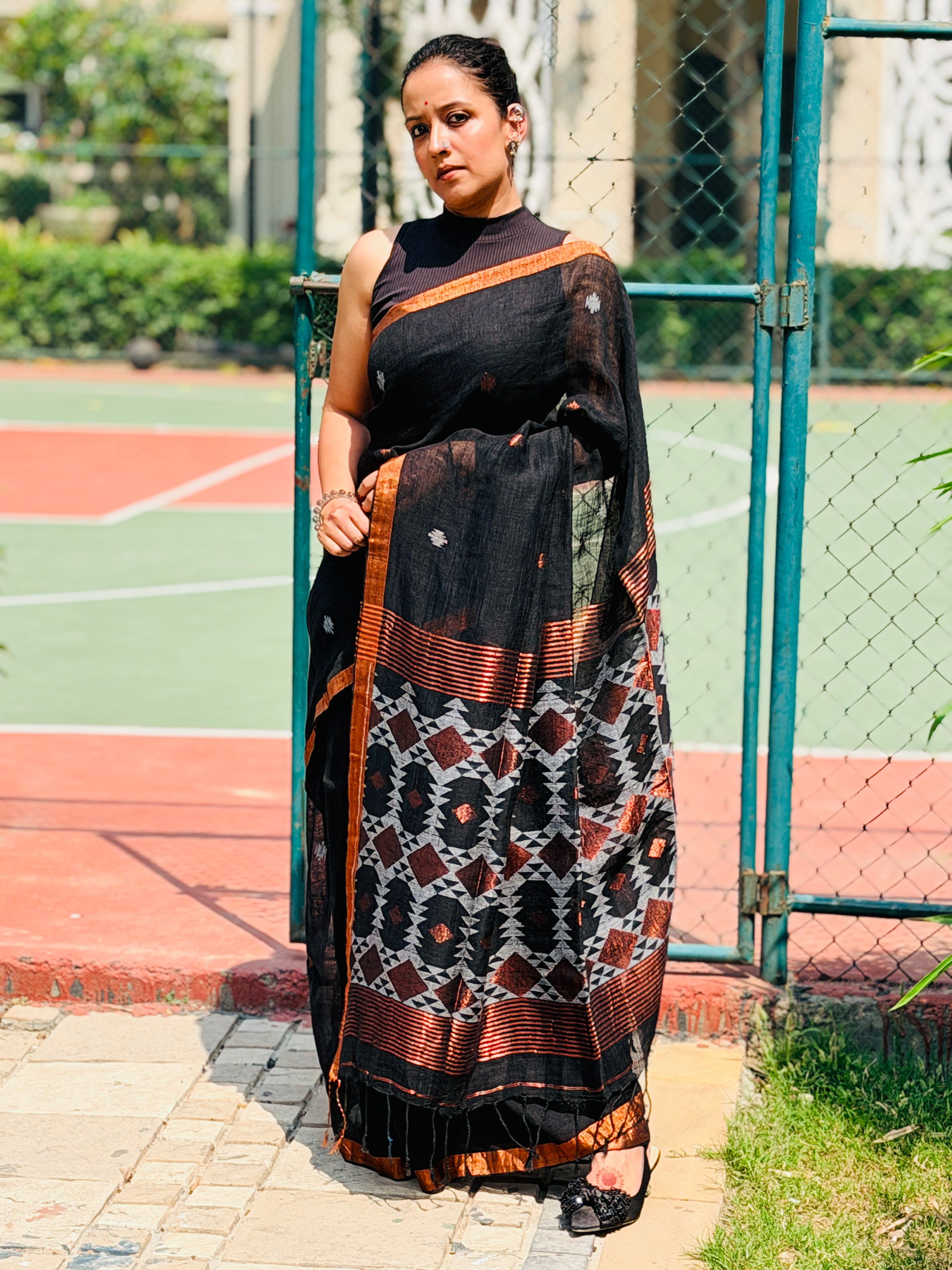 Black Pure handwoven linen saree with burfi design