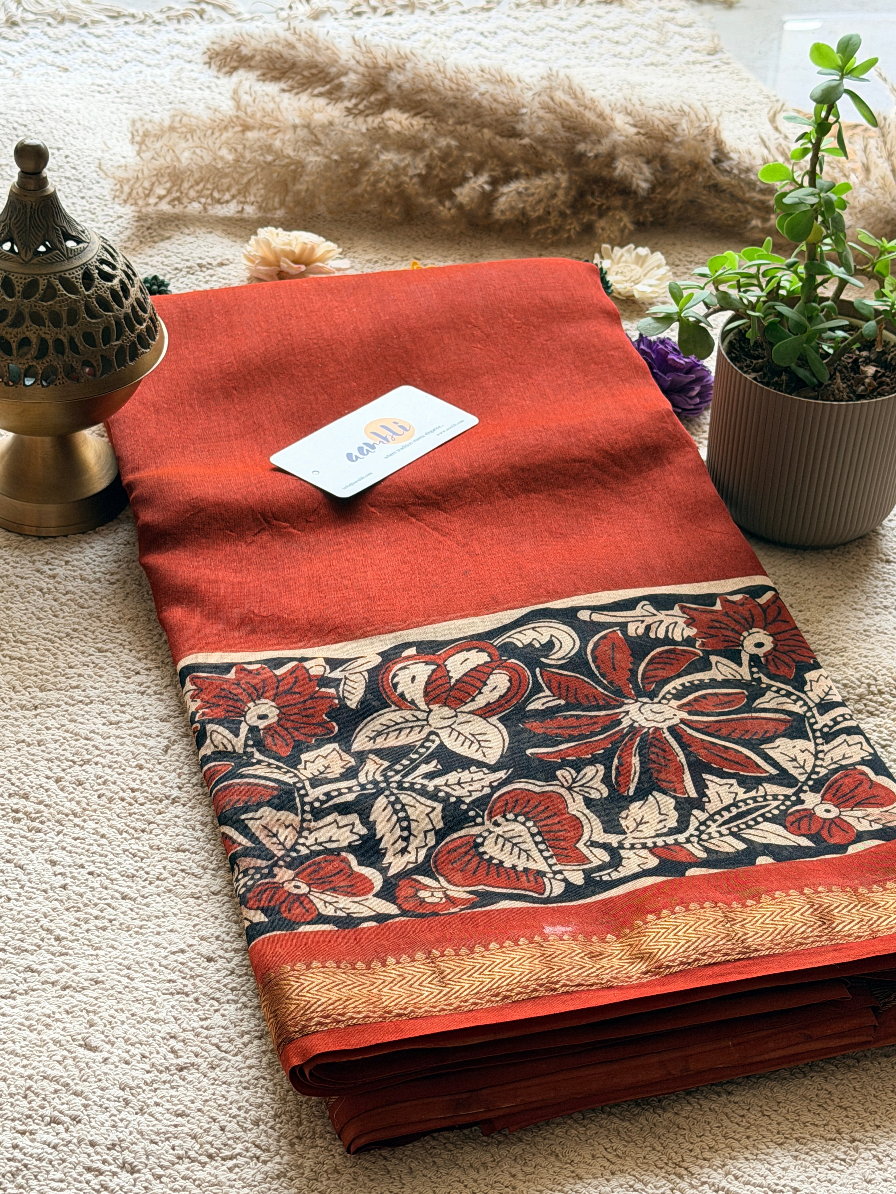 Rust Flower Handblock Maheshwari saree