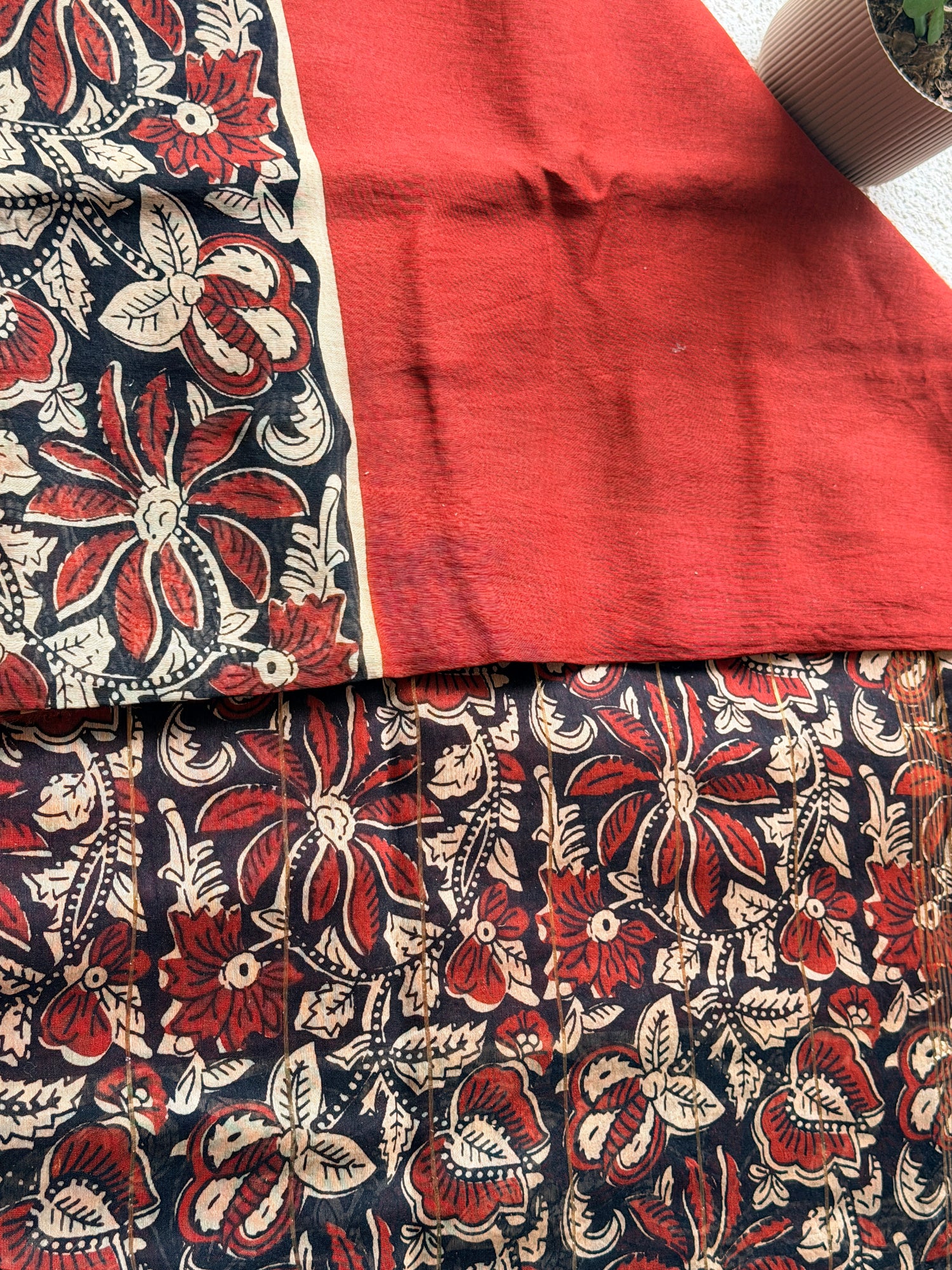Rust Flower Handblock Maheshwari saree