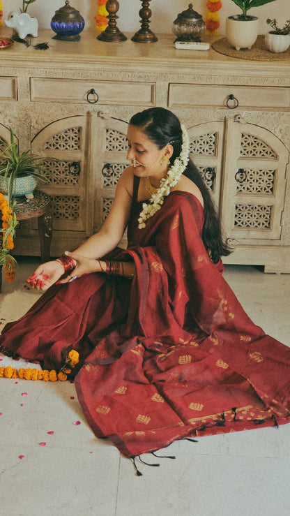 Maroon pure handwoven linen saree with zari booti design