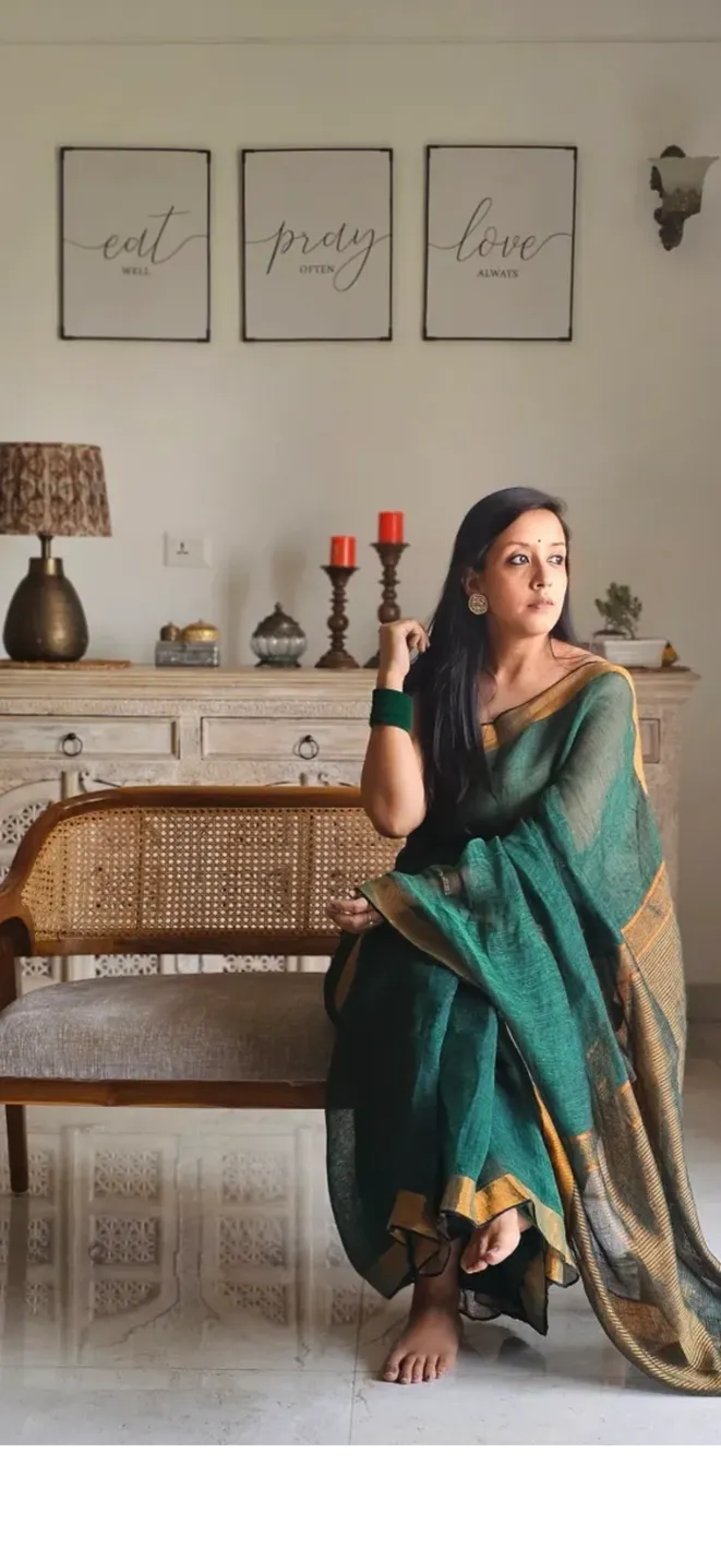 Green Pure Handwoven Linen saree with Zari strips