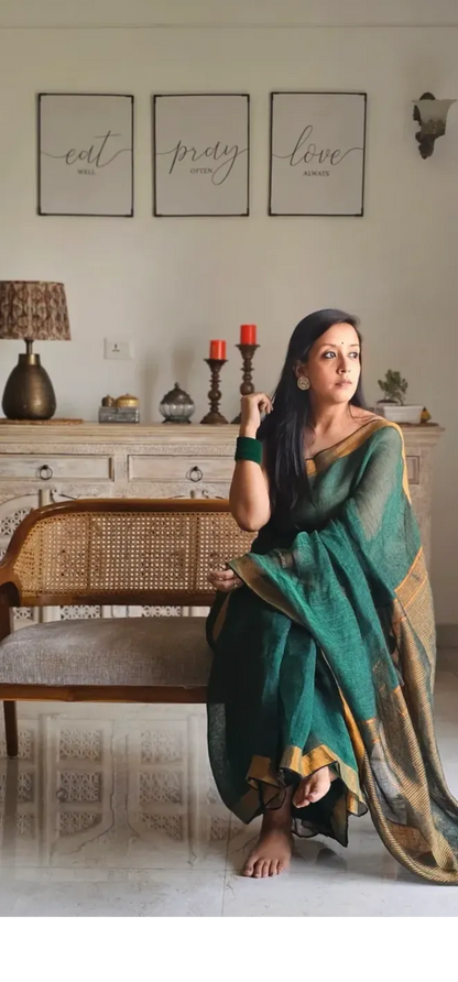 Green Pure Handwoven Linen saree with Zari strips