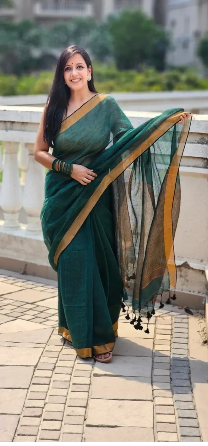 Green Pure Handwoven Linen saree with Zari strips
