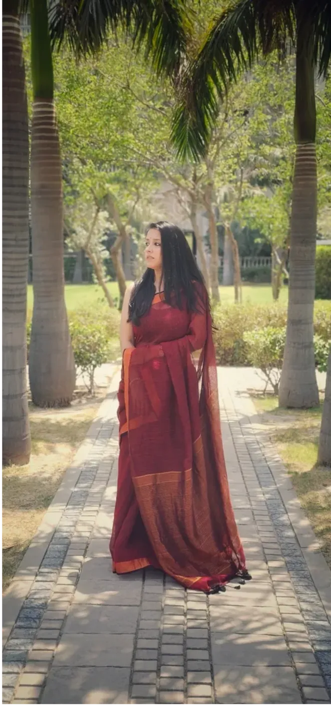 Maroon Pure Handwoven Linen saree with Zari strips